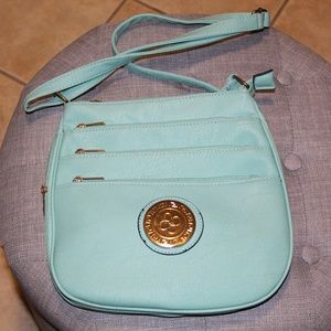 Blue with gold accents purse.